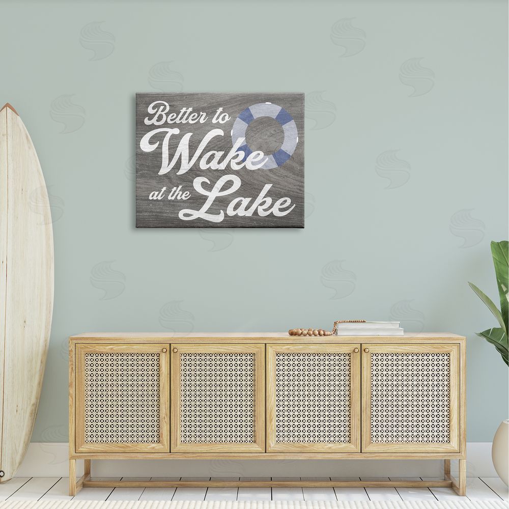 Stupell Studio Wake at Lake Rustic Cabin Sign Life Preserver Ring Canvas Wall Art Print in Room