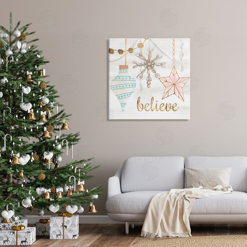Annie Warren Glimmering Believe Text Holiday Ornaments Star Snowflake Canvas Wall Art in Room
