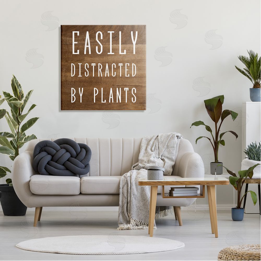 Stupell Studio Easily Distracted By Plants Rustic Plank Patterned Text Canvas Wall Art in Room