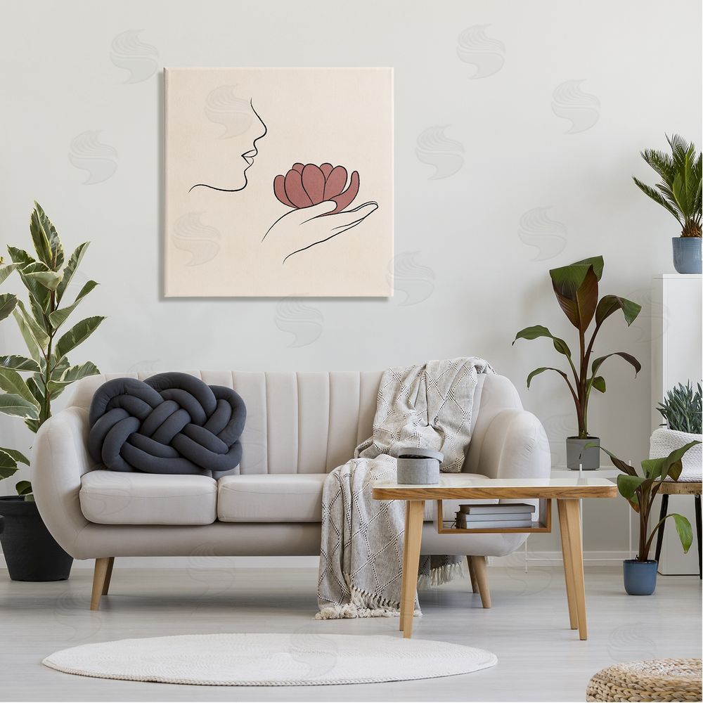 JJ Design House LLC Minimal Face Profile Holding Blossom Palm Outline Canvas Wall Art in Room