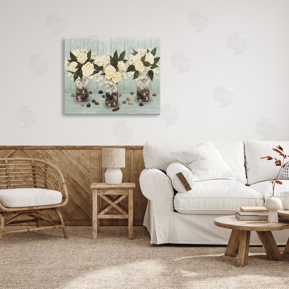 Ziwei Li Three Rose Bouquets Scattered Rocks Flower Arrangement Canvas Wall Art Print in Room