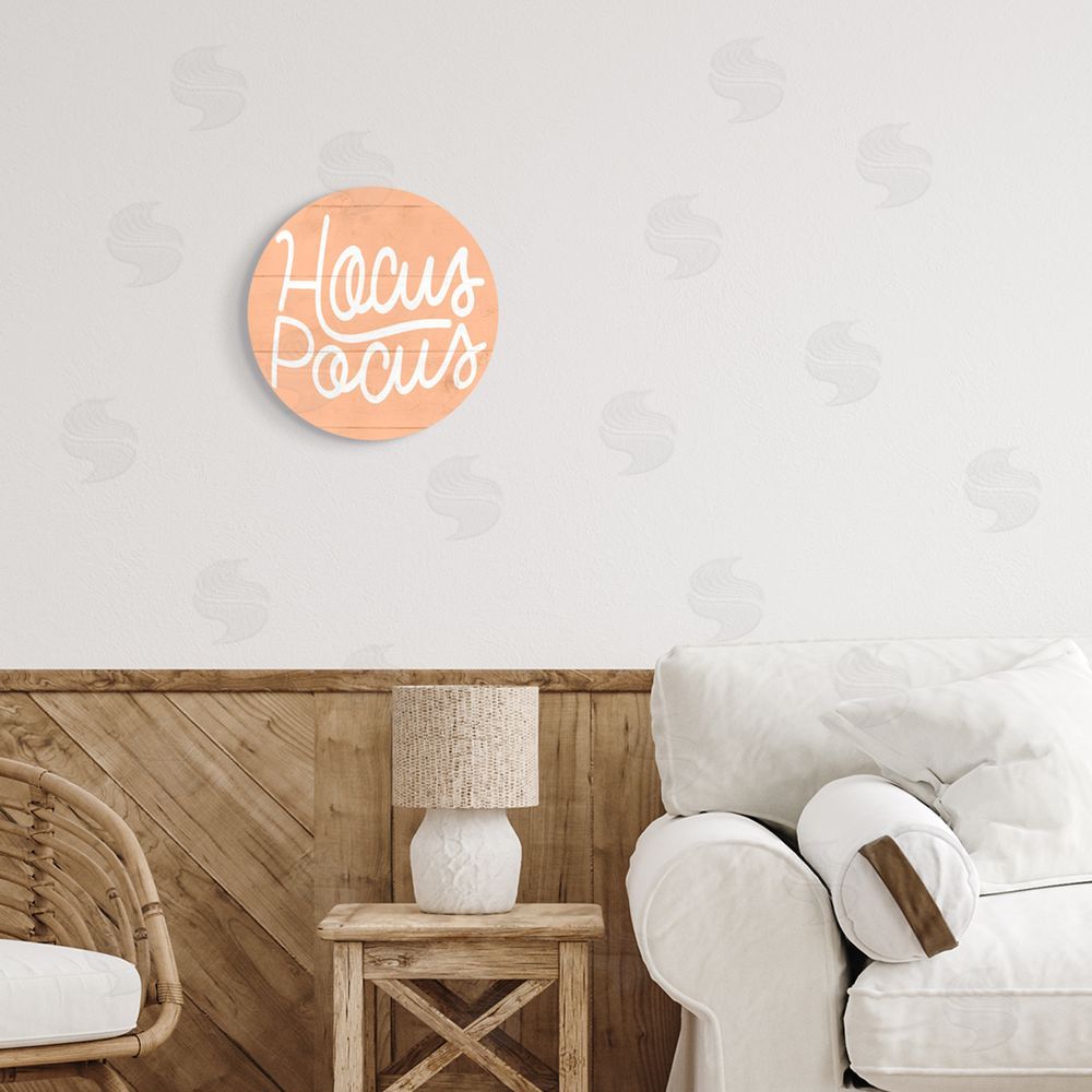 Stupell Studio Hocus Pocus Halloween Phrase Round Wall Plaque Art Print in Room