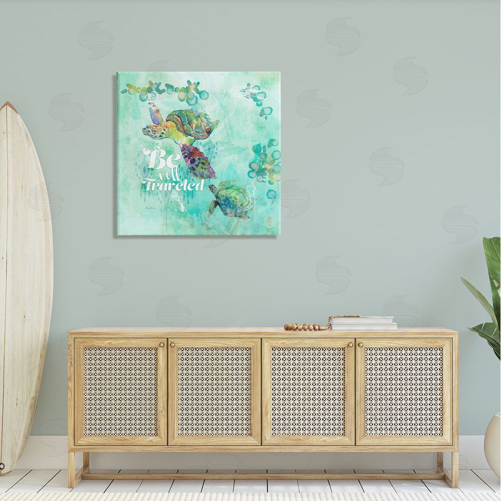 Evelia Designs Be Well Traveled Sea Turtle Swimming Canvas Wall Art in Room