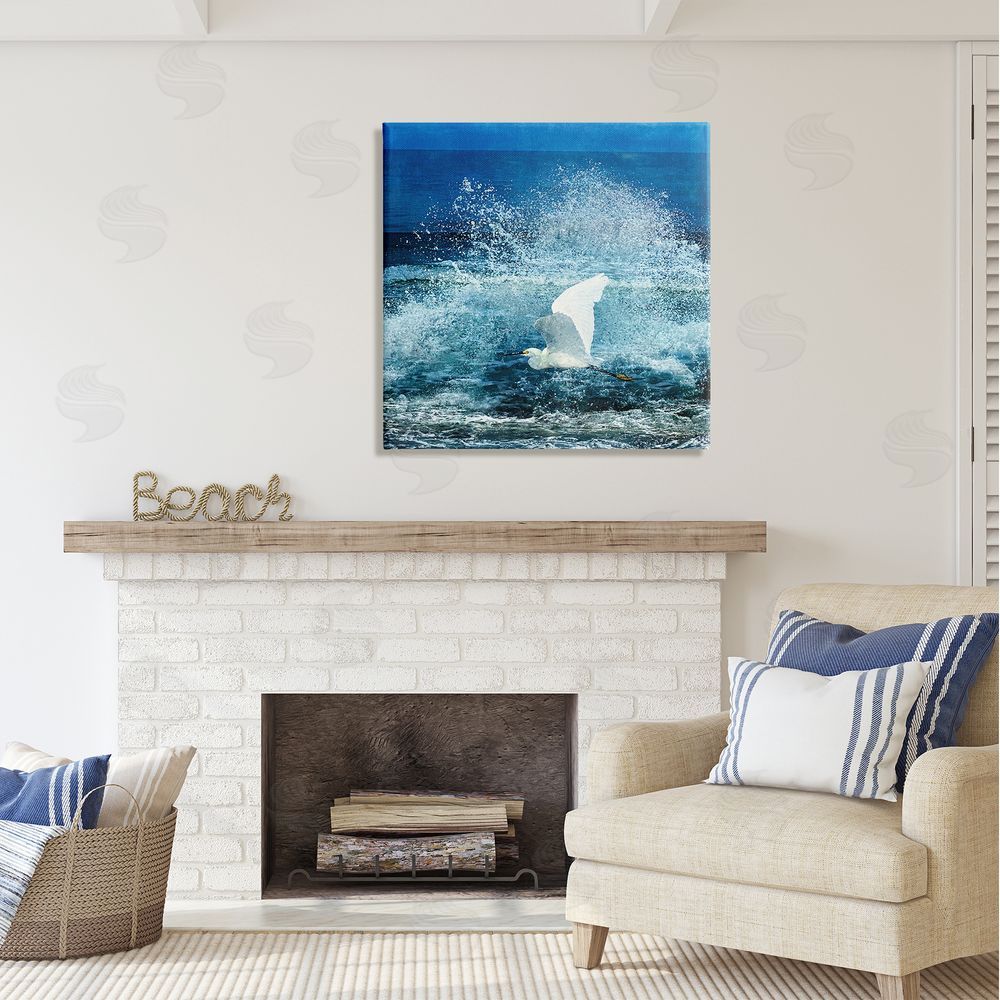 Christine Zalewski Egret Flying Waves Splashing Canvas Wall Art in Room
