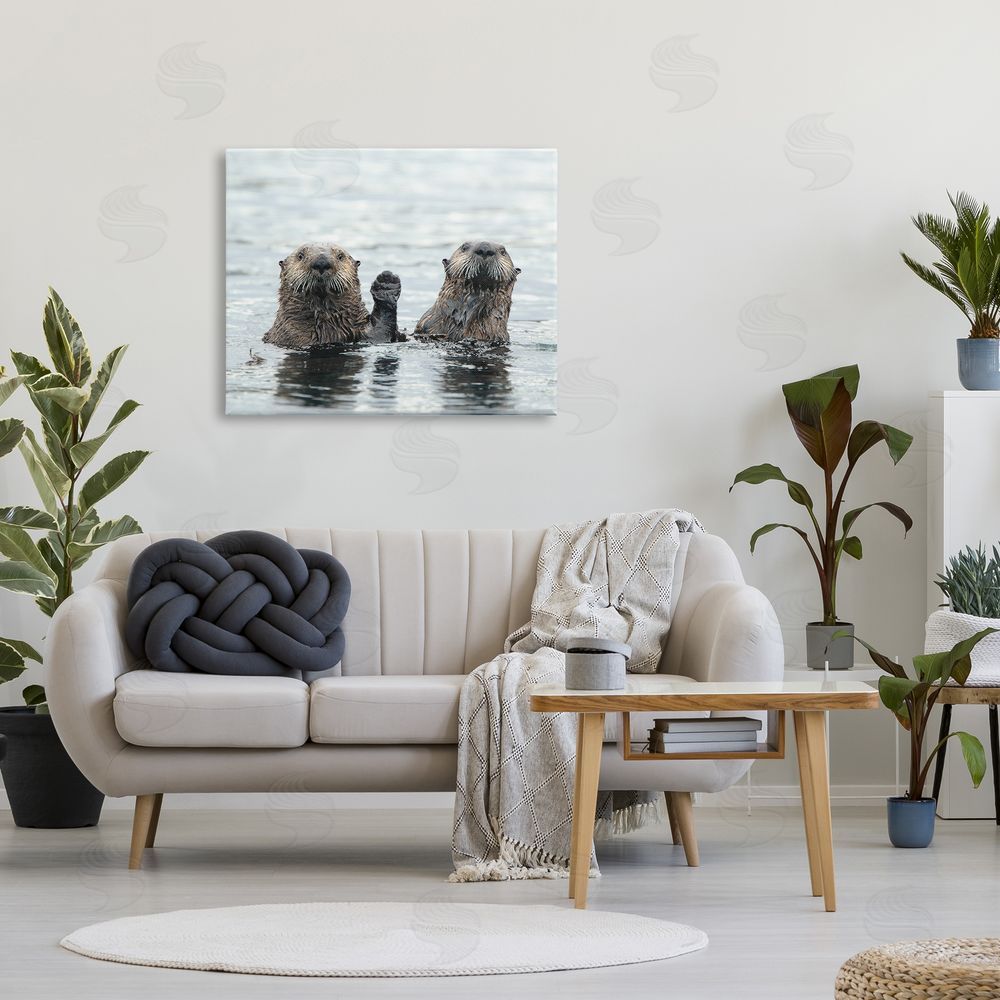 Donna Bourdon Peeking Otters in Water Canvas Wall Art Print in Room