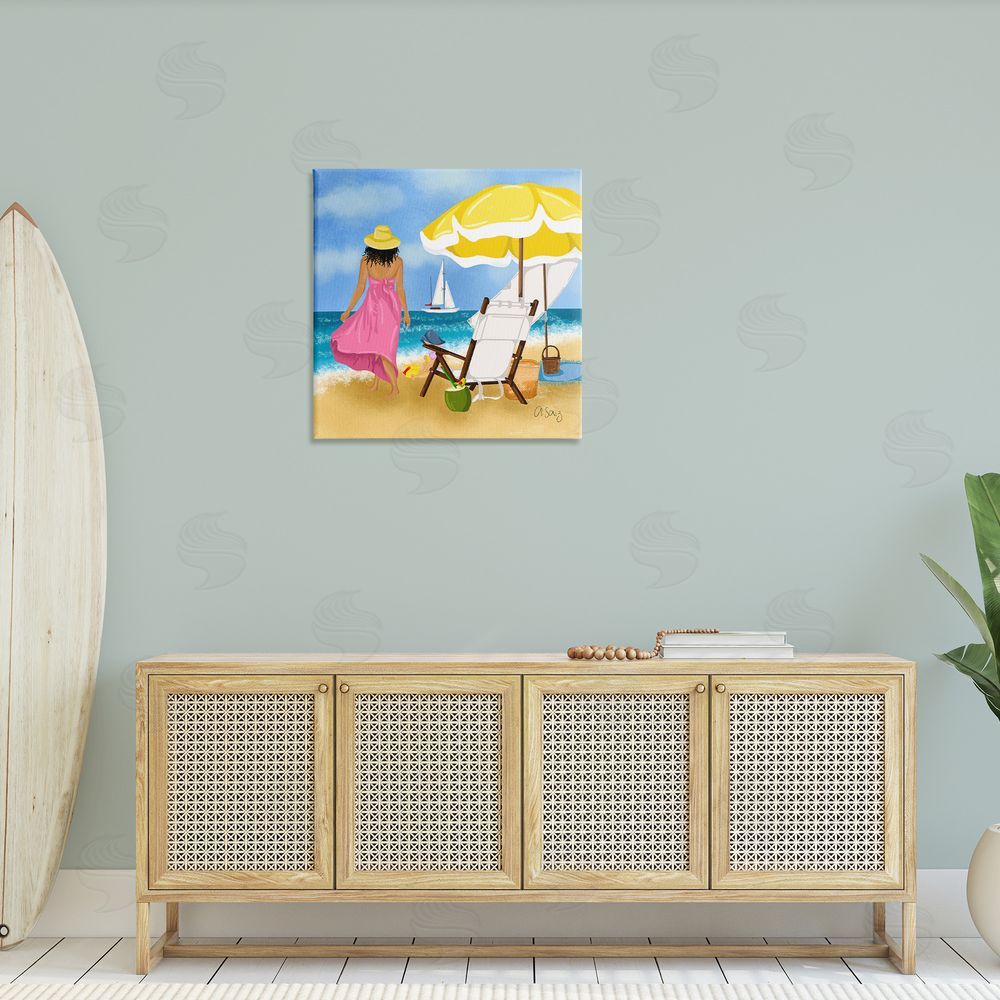 Ale Saiz Studio Woman Strolling Beach Canvas Wall Art in Room