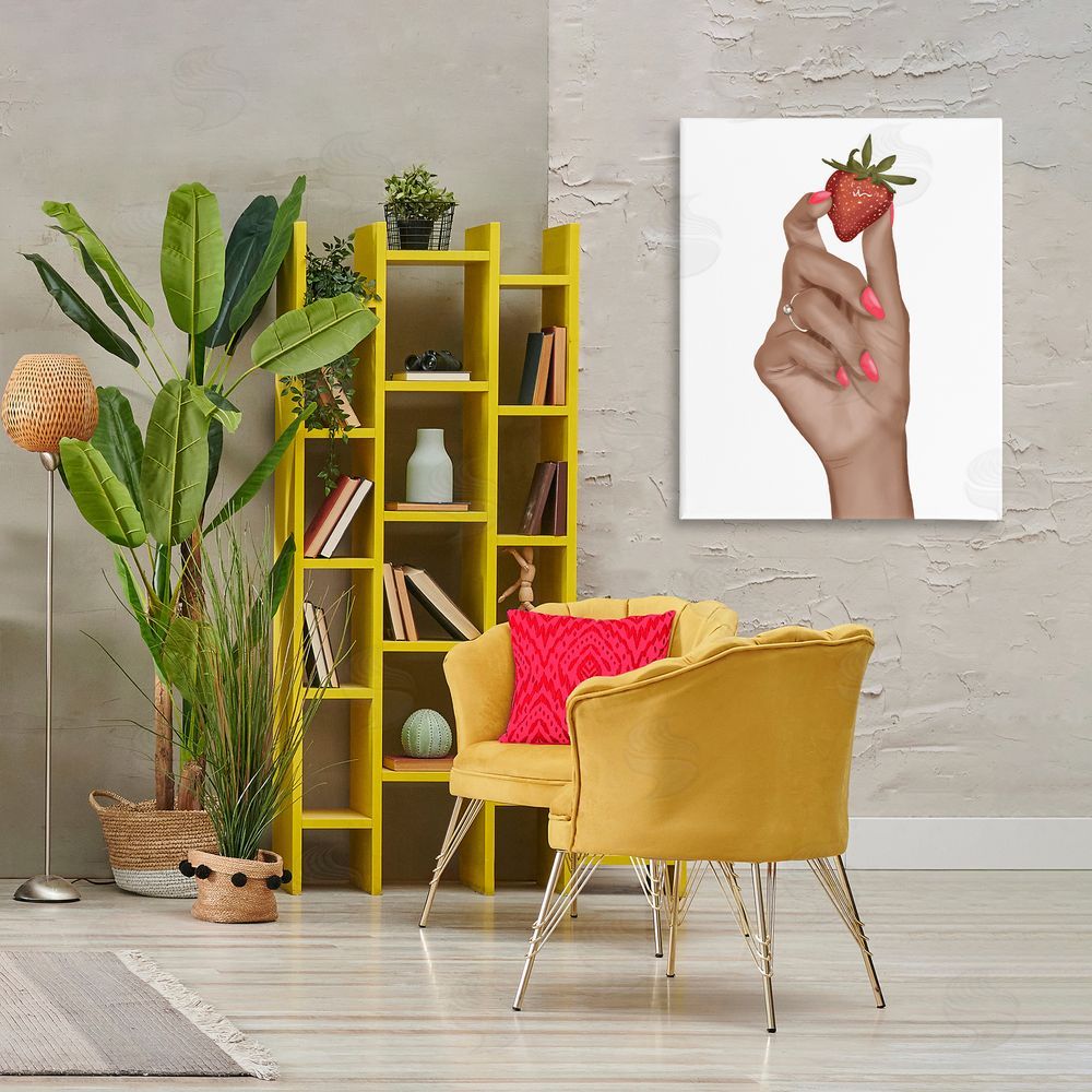 Saba Rauf Holding Juicy Strawberry Canvas Wall Art Print in Room