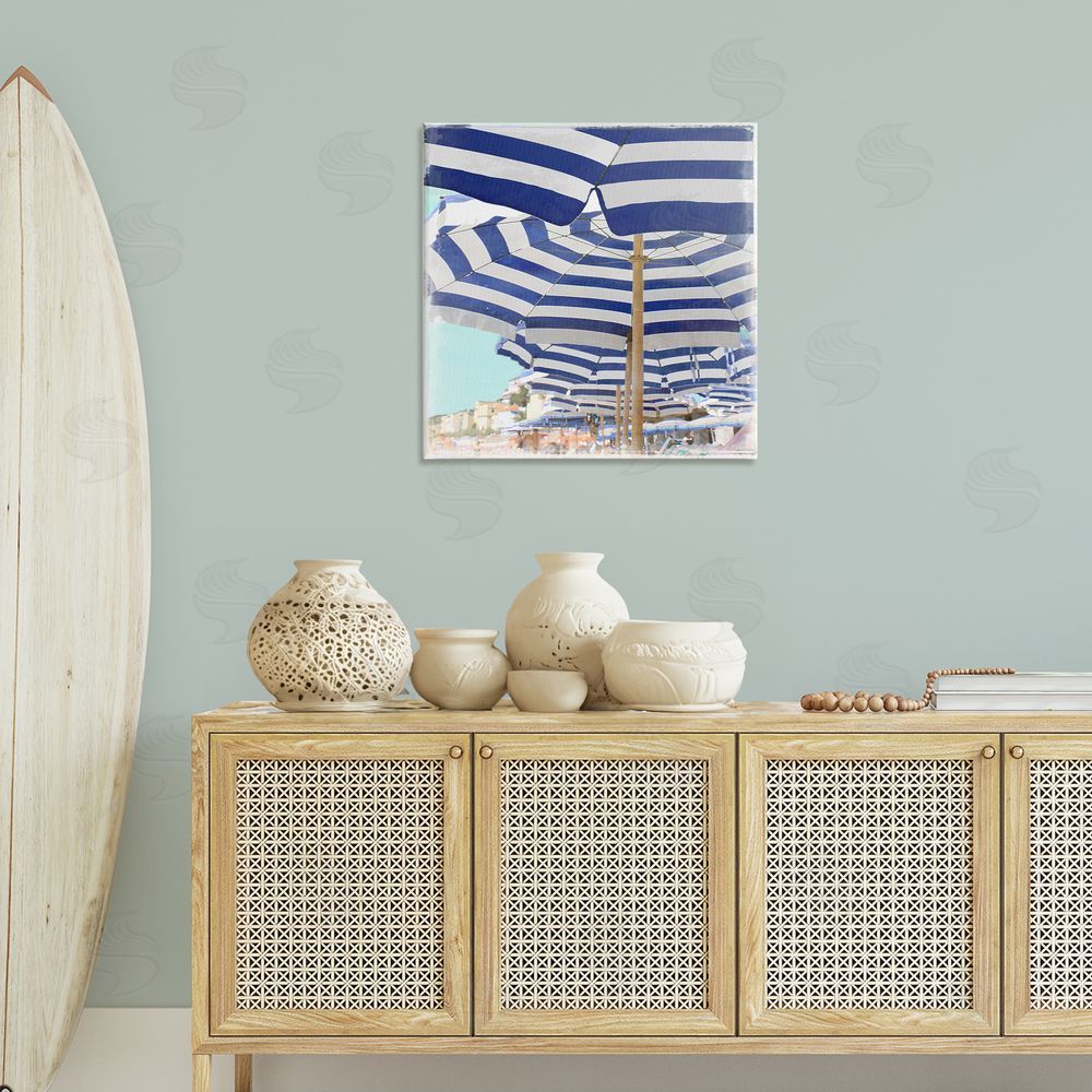 Charlie Carter Under Beach Umbrellas Canvas Wall Art Print in Room