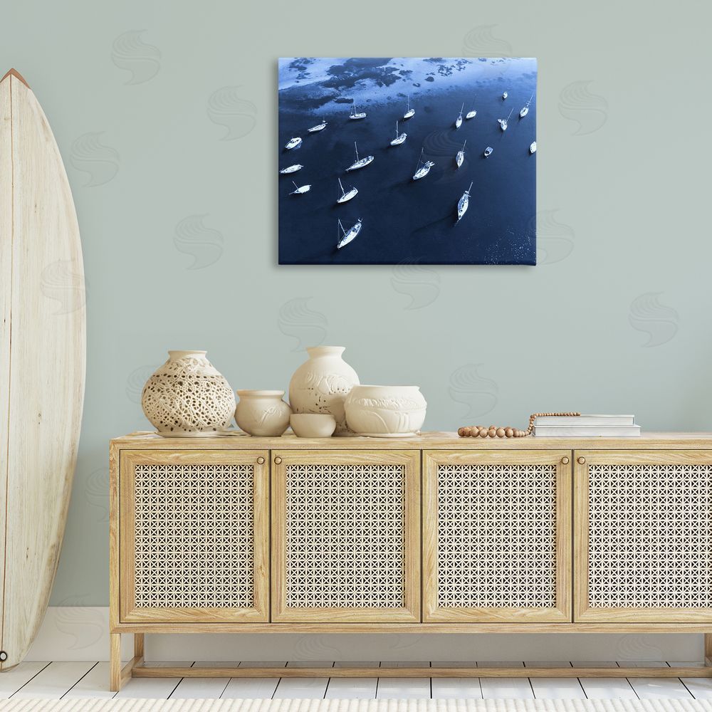 Stupell Studio Scattered Boats on Sea Canvas Wall Art Print in Room