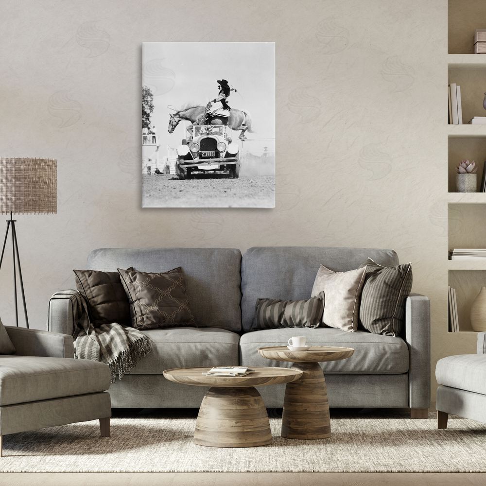 Stupell Studio Rodeo Girl Jumping Horse Canvas Wall Art Print in Room