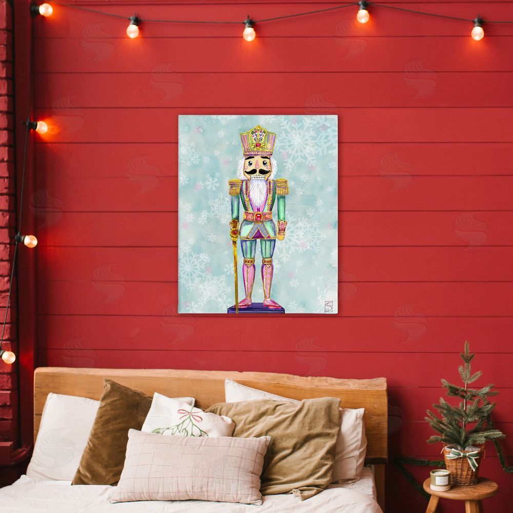 Sara Culpepper Pastel Nutcracker over Snowflakes Printed Wall Art in Room