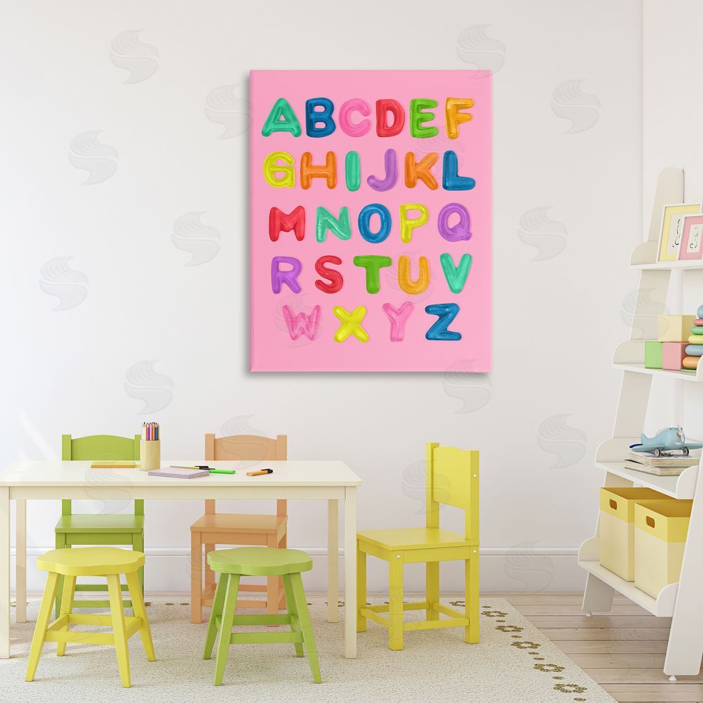 LISH Creative Gummy Alphabet over Pink Stretched Canvas Wall Art in Room