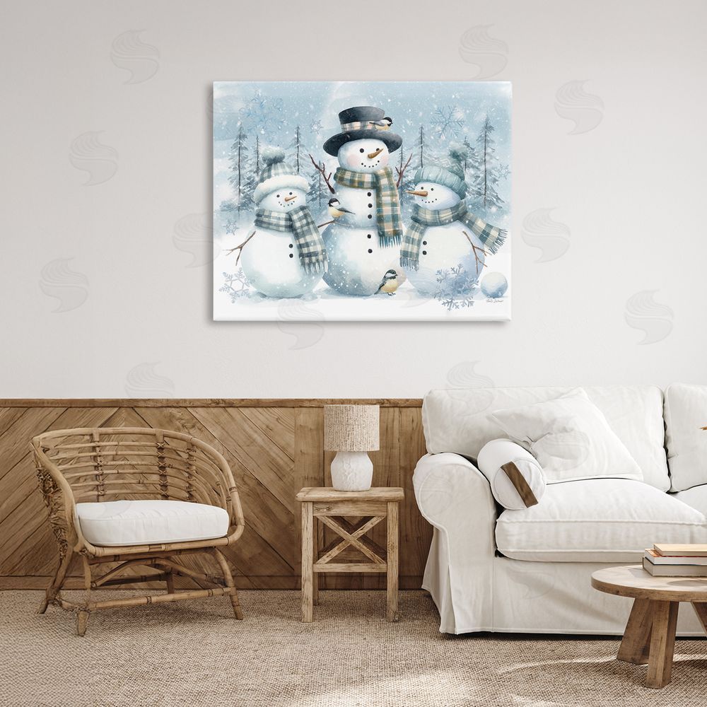 Nicole DeCamp Snowmen Trio and Bird Canvas Art on Wall