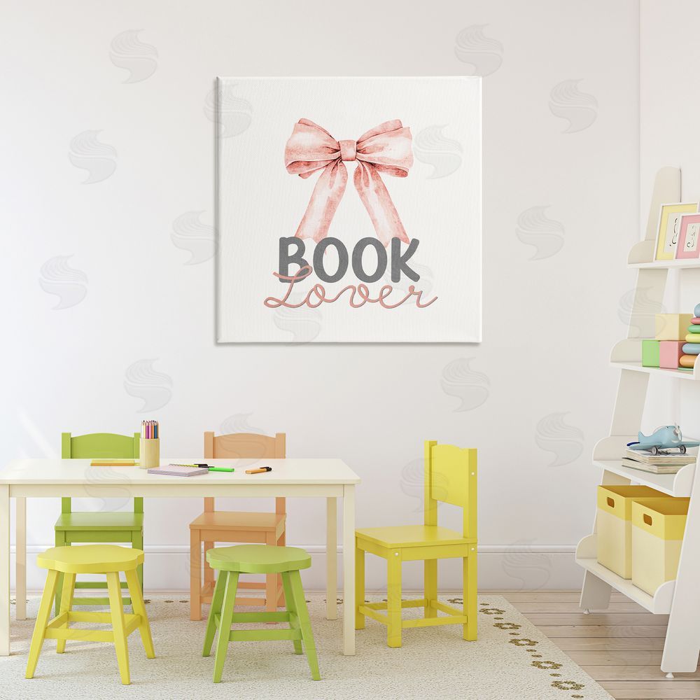 Kim Allen Book Lover Pink Bow Stretched Canvas Wall Art in Room
