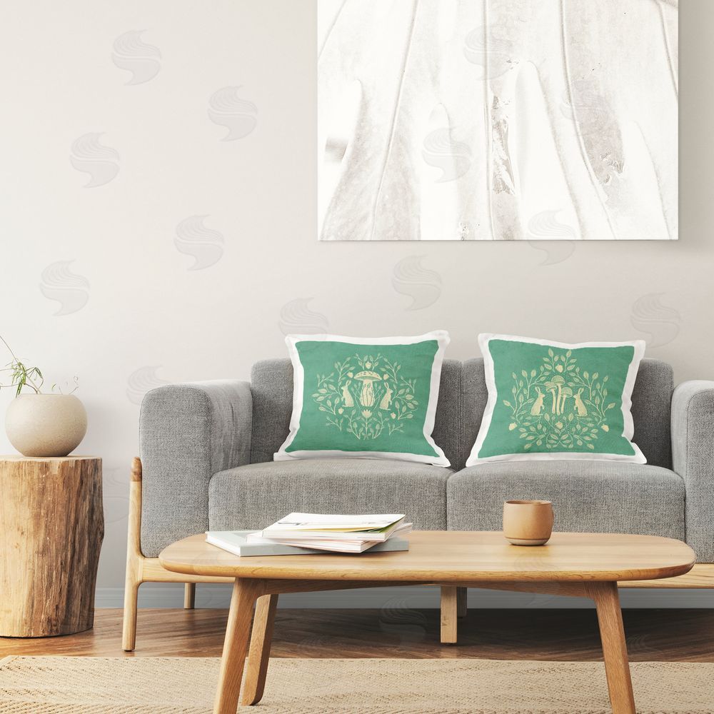 Katie O'Shea Boho Symmetrical Rabbits Printed Plush Polyester Throw Pillow On Chair