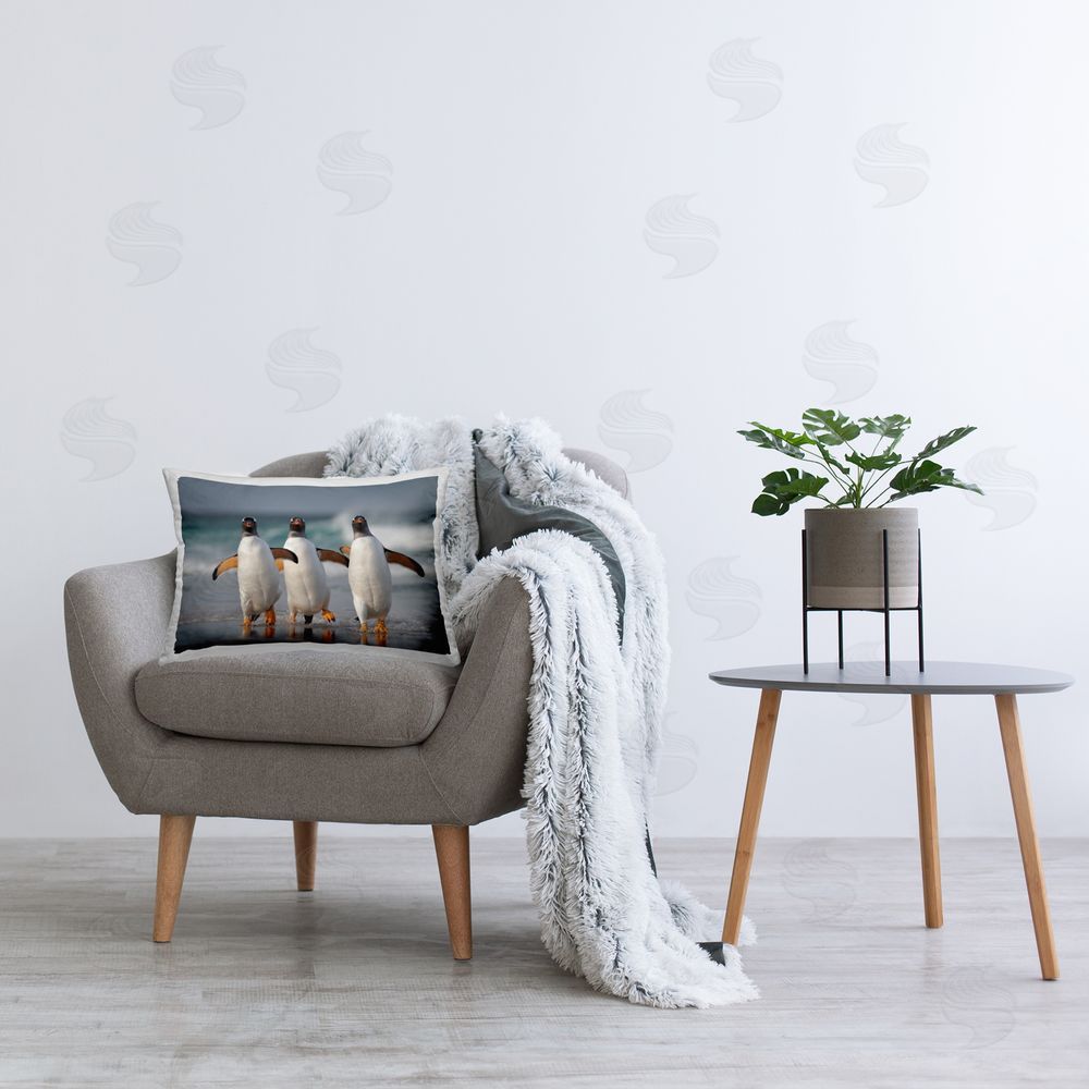 Joshua Galicki Dancing Penguins on Beach Printed Plush Polyester Throw Pillow On Chair
