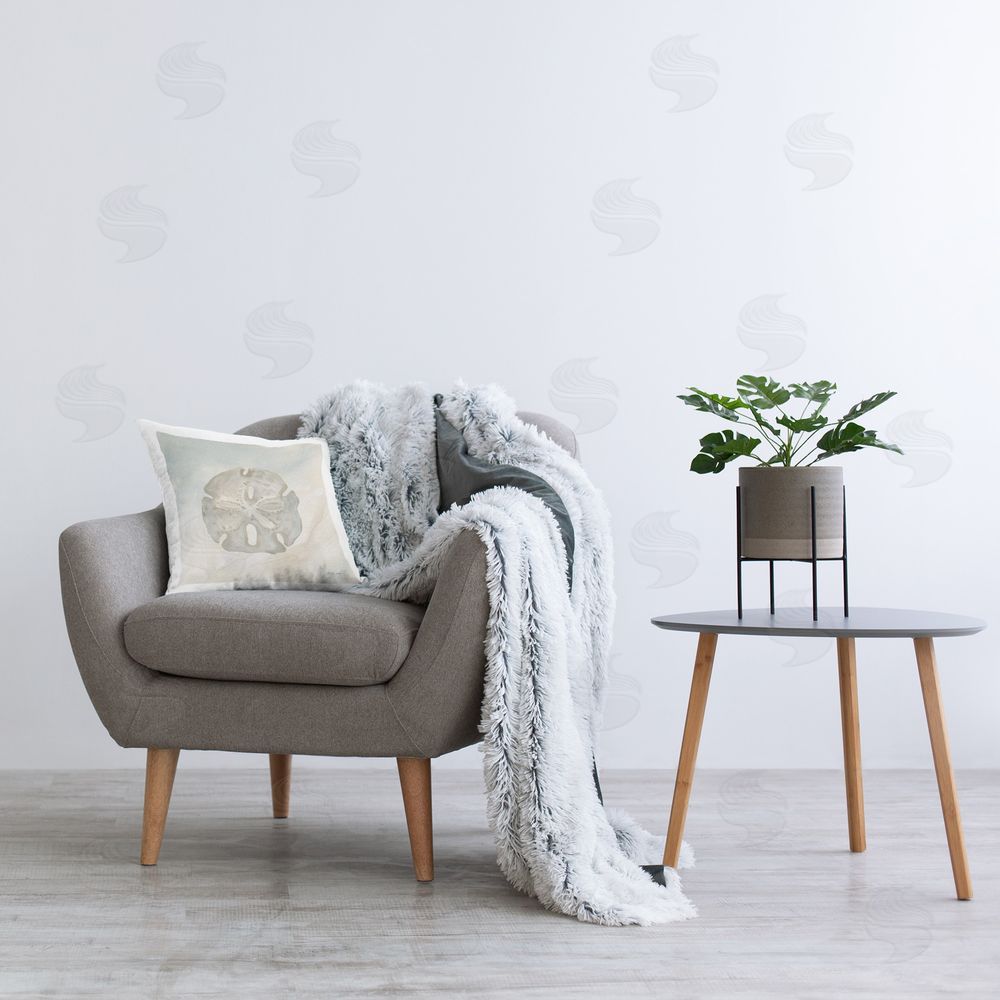 Yvette St. Amant Sand Dollar over Beige Printed Plush Polyester Throw Pillow On Chair