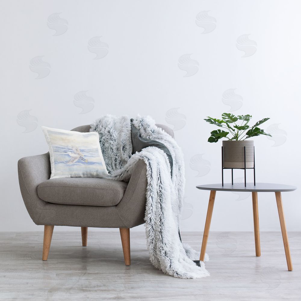 Audrey Jeanne Roberts Flying Heron Over Water Printed Plush Polyester Throw Pillow On Chair