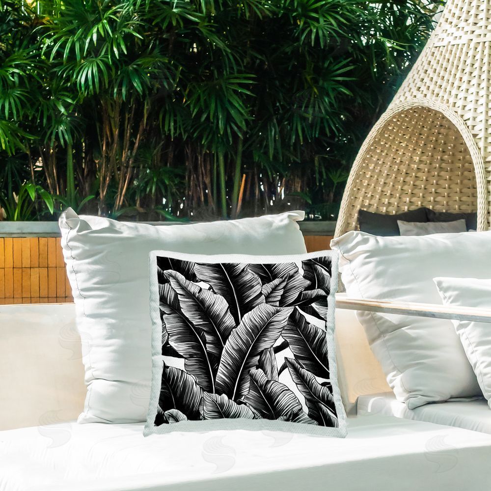 Walker Noble Black Bold Fronds Outdoor Quick-Dry Polyester Printed Throw Pillow in Back Yard