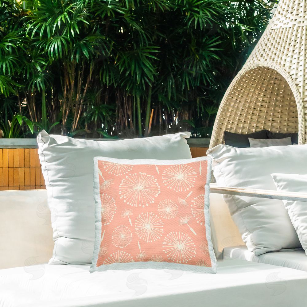 Carrie Cantwell Pink Delicate Dandelions Outdoor Quick-Dry Polyester Printed Throw Pillow in Back Yard