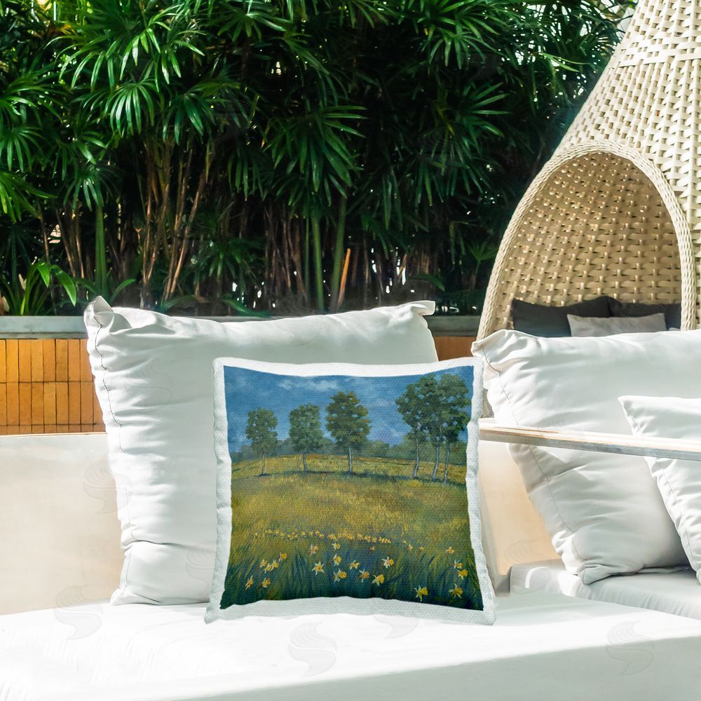 Graham Reynolds Meadow with Daffodils Outdoor Quick-Dry Polyester Printed Throw Pillow in Back Yard
