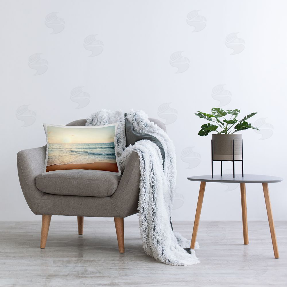 Nataly White Rolling Tide Beach Printed Plush Polyester Throw Pillow On Chair