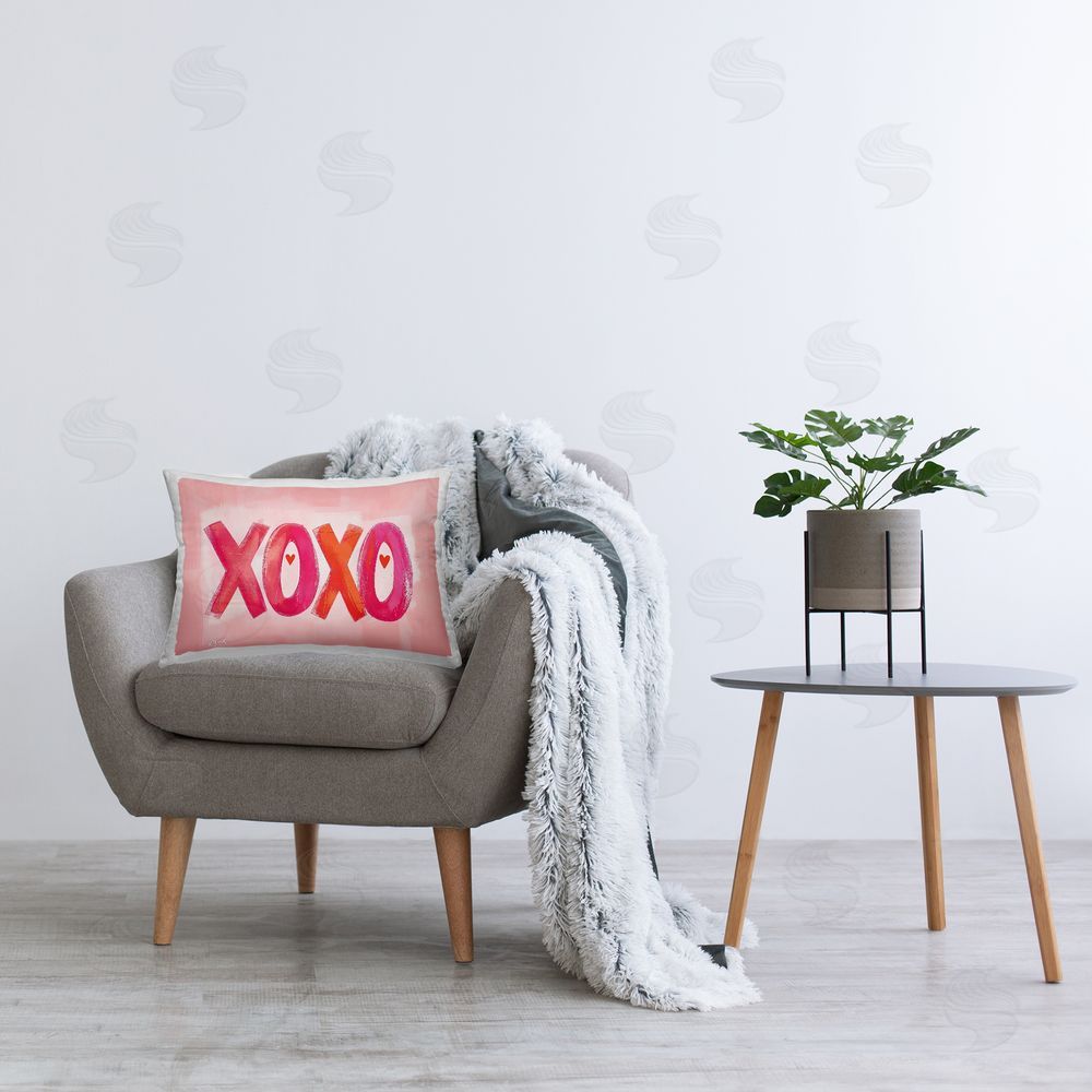 LSR Design Studio Pink XOXO with Hearts Printed Plush Polyester Throw Pillow On Chair