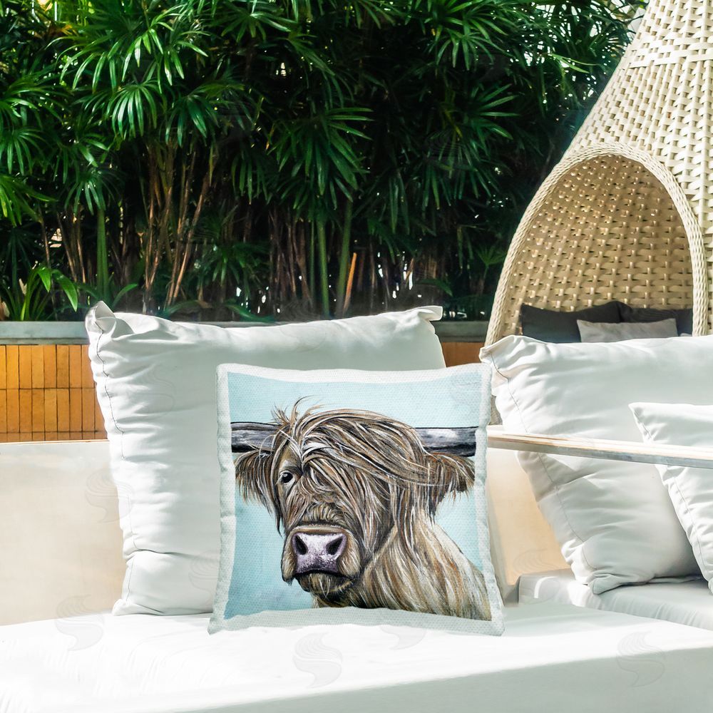 Jennifer Seeley Highland Cow Windblown Outdoor Square Pillow on Patio