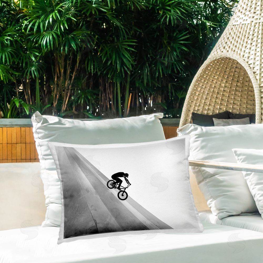 Sisi and Seb Black and White Biker Outdoor Printed Throw Pillow on Patio
