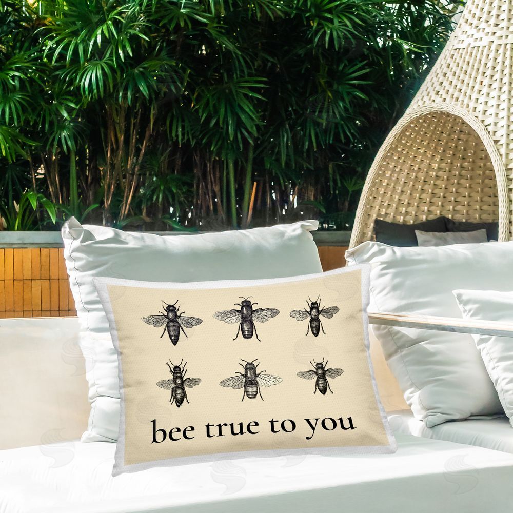 Lettered and Lined Bee True To You Inspiration Outdoor Rectugular Printed Throw Pillow on Patio