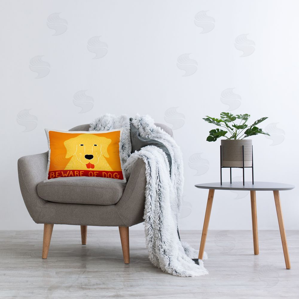 Stephen Huneck Beware Of Dog Yellow & Red Rectugular Printed Throw Pillow on Chair