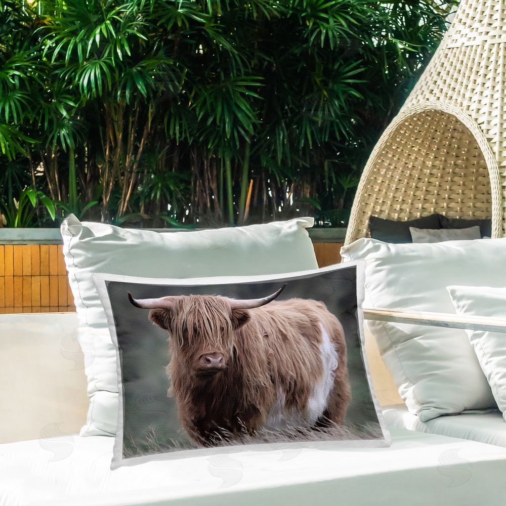 Marcus Prime Wandering Harry Highland Cattle Printed Throw Pillow on Patio