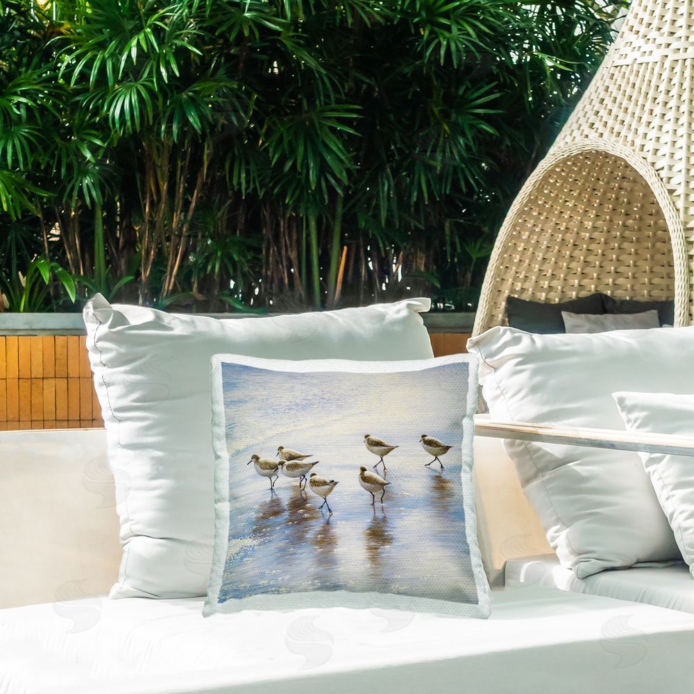 Bruce Nawrocke Sand Dancers on Shore Outdoor Printed Throw Pillow on Patio