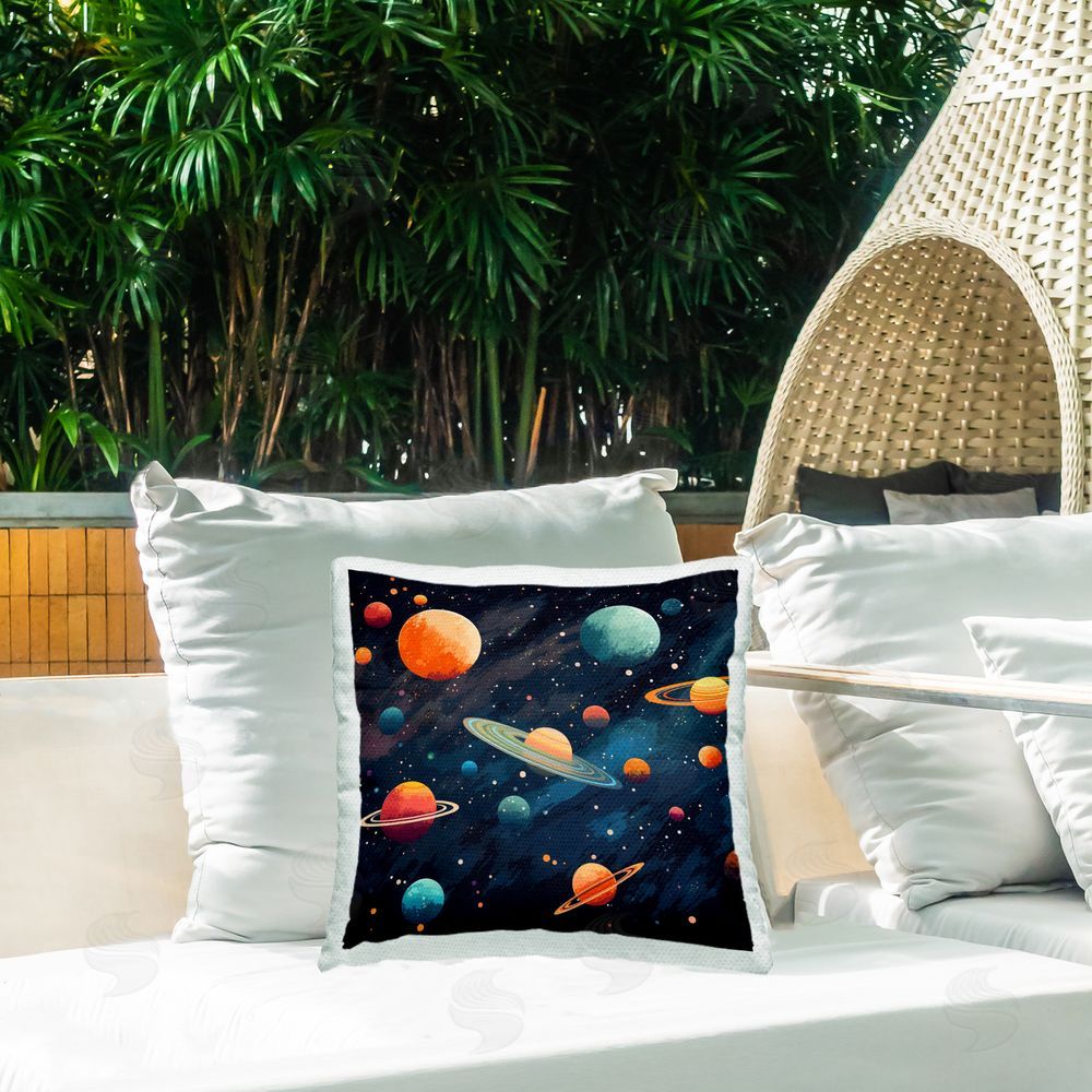 Creative Studio Orange & Blue Planets in Orbit Outdoor Square Printed Throw Pillow on Seat