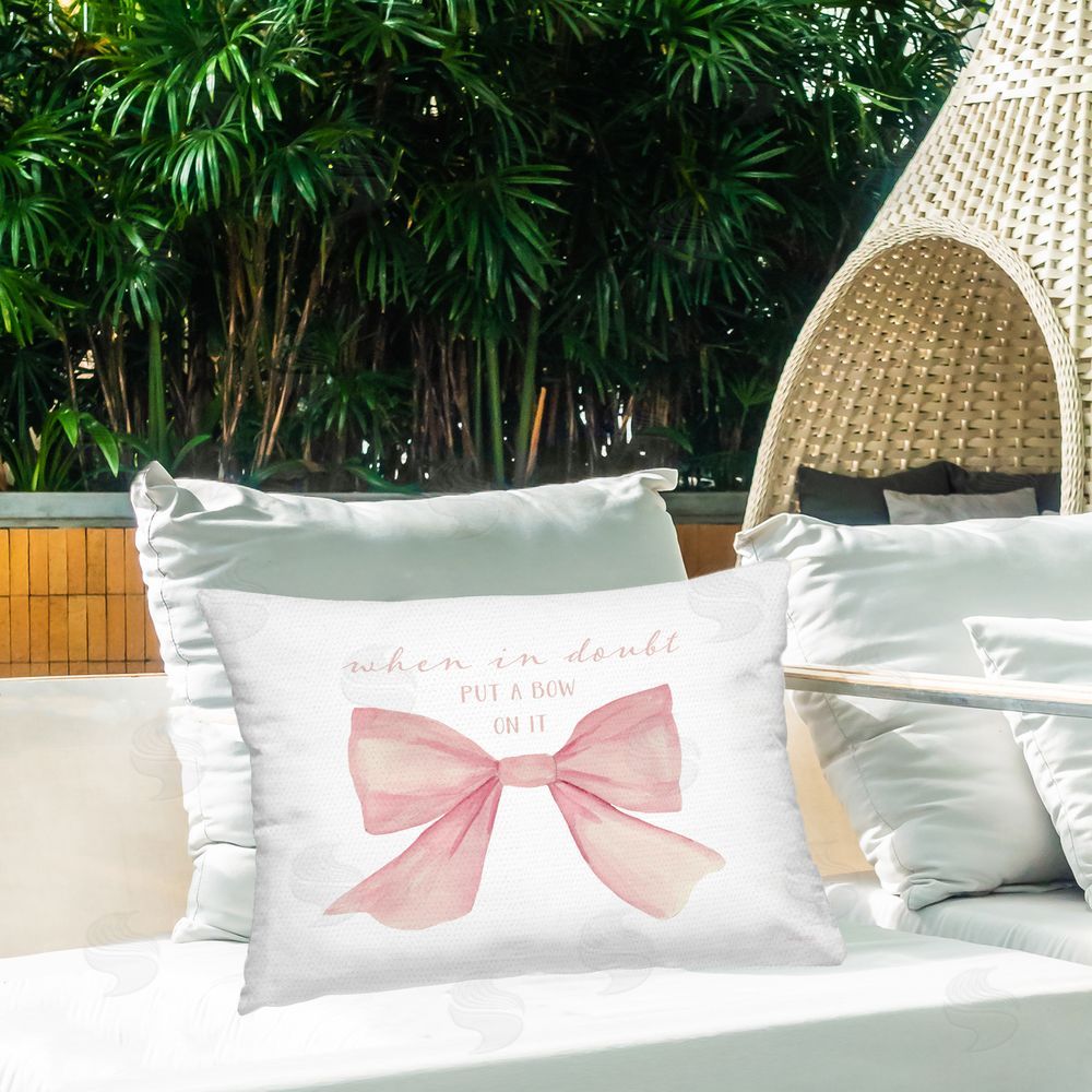 Cindy Jacobs Put A Bow On It Outdoor Quick-Dry Polyester Printed Lumbar Pillow on Patio