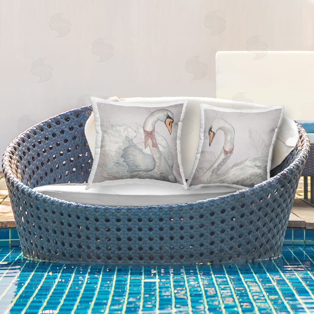 Elizabeth Medley Classic Swans with Bows Outdoor Printed Throw Pillow on Patio