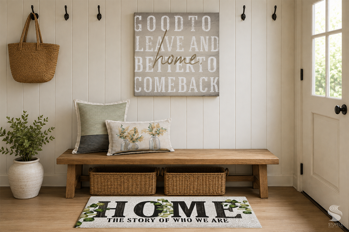 Wood entryway bench with striped and botanical pillows, homecoming wall art, woven storage baskets, and a leafy HOME floor mat.