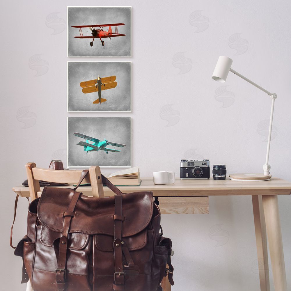 Ashley Calhoun Vintage Airplanes at Flight Red Yellow Blue Canvas Wall Art Print in Room