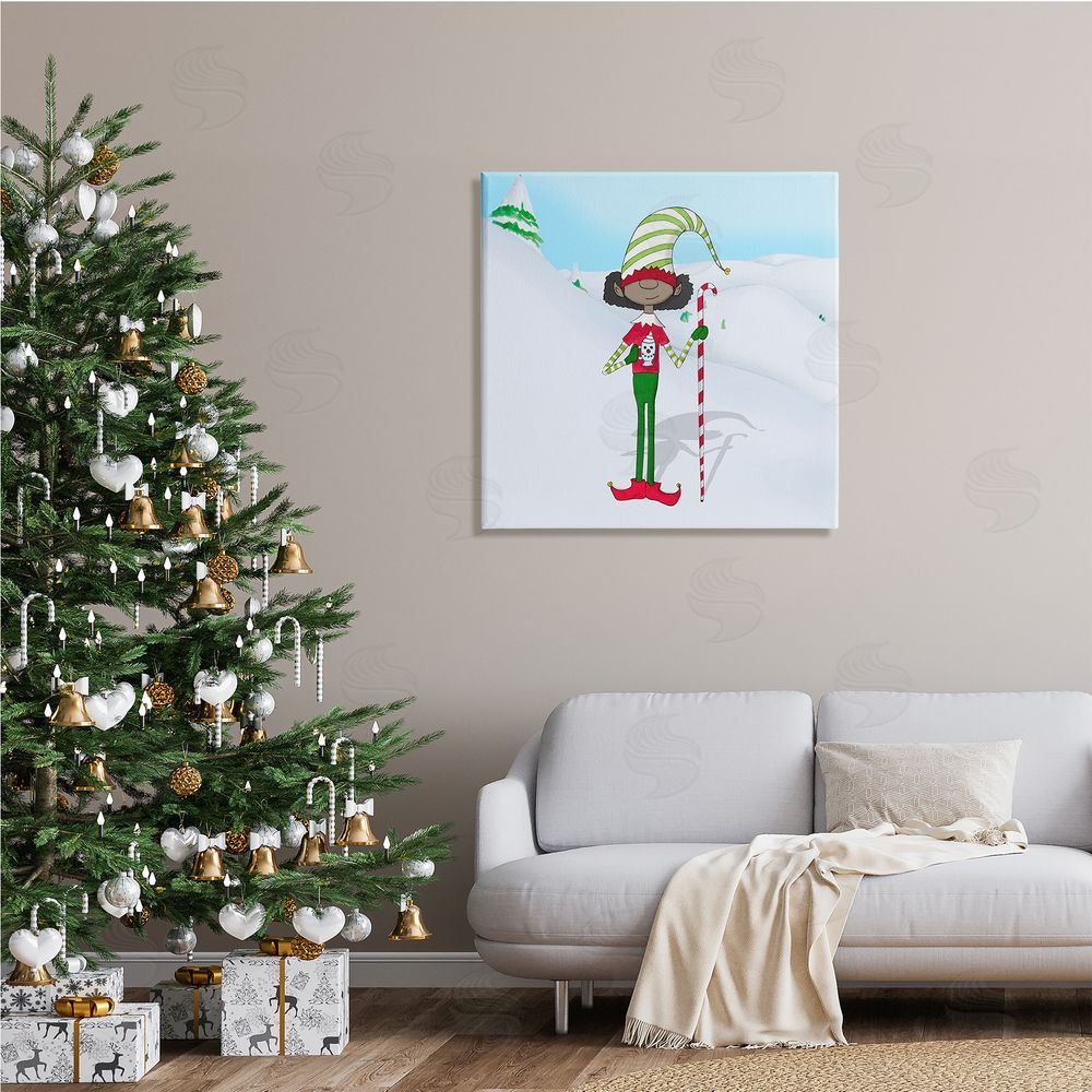 Hugo Edwins Holiday Elf with Hot Cocoa Snowy Winter Scene Canvas Wall Art in Room