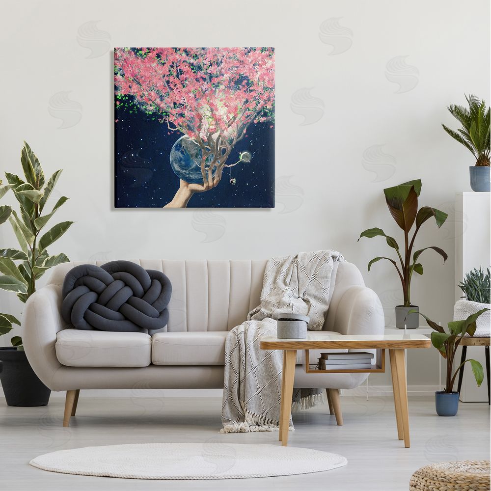 Paula Belle Flores Hand Holding Earth Blossoms Surreal Planet Lunar Starry Night Canvas Wall Art in Room