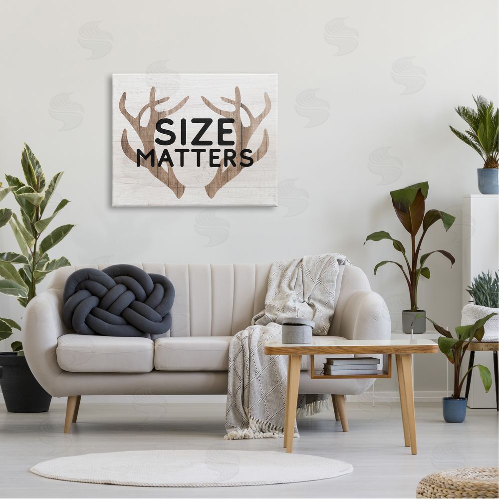 Stupell Studio Size Matters Funny Antlers Rustic Camping Typography  Canvas Wall Art Print in Room