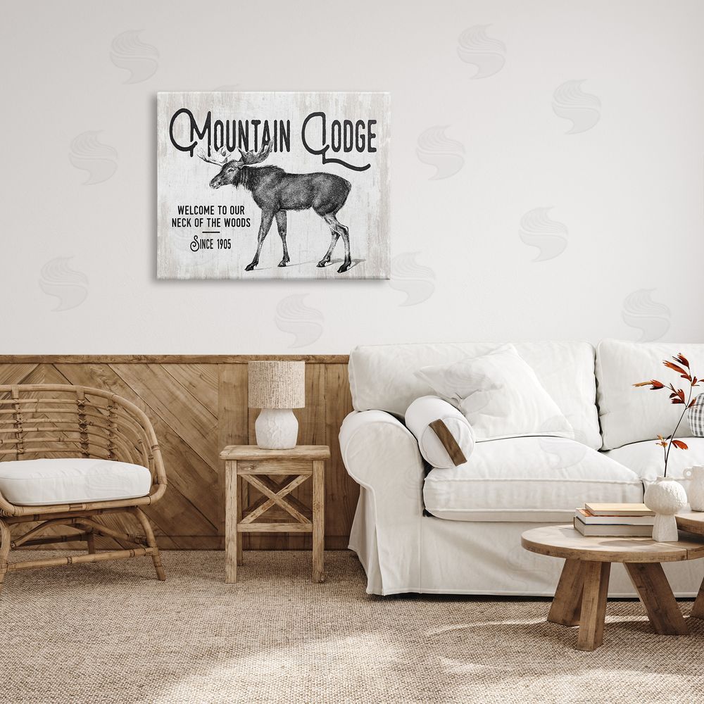 Lettered and Lined Rustic Mountain Lodge Vintage Moose Cabin Sign  Canvas Wall Art Print in Room