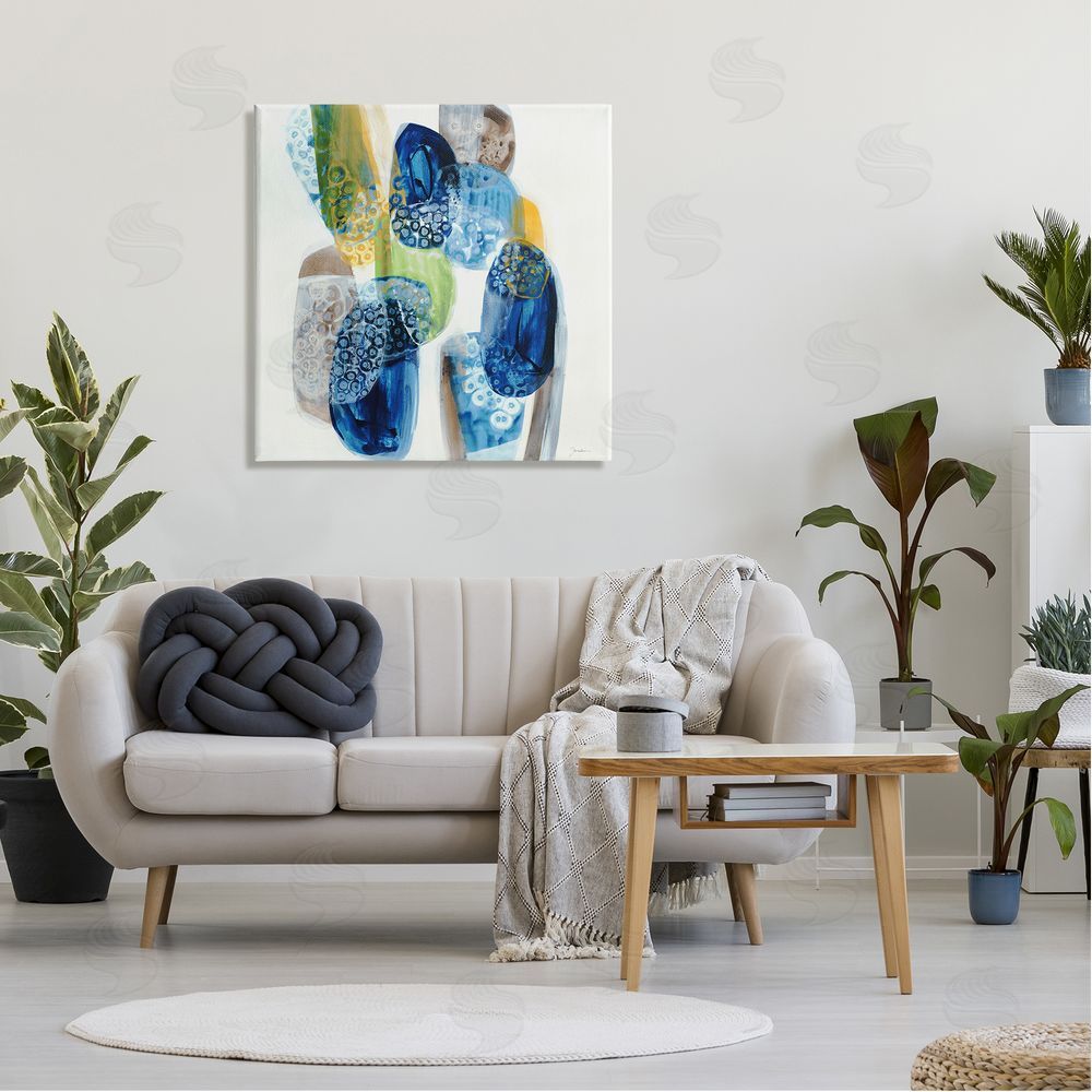 Liz Jardine Pebbled Circular Shapes Vivid Blue Modern Design Canvas Wall Art in Room