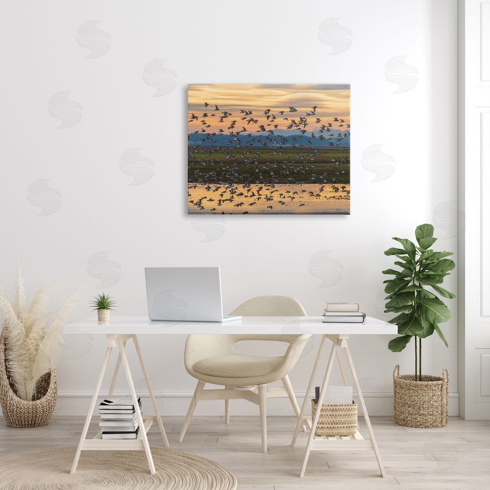 Nancy Crowell Flock of Birds Flying Lake Reflection Orange Sunset Canvas Wall Art Print in Room