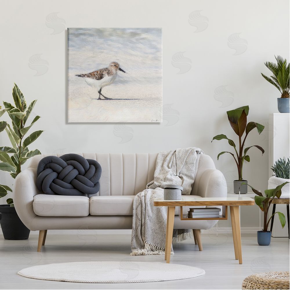 Denise Brown Sandpiper Bird Stepping Beach Sand Canvas Wall Art in Room