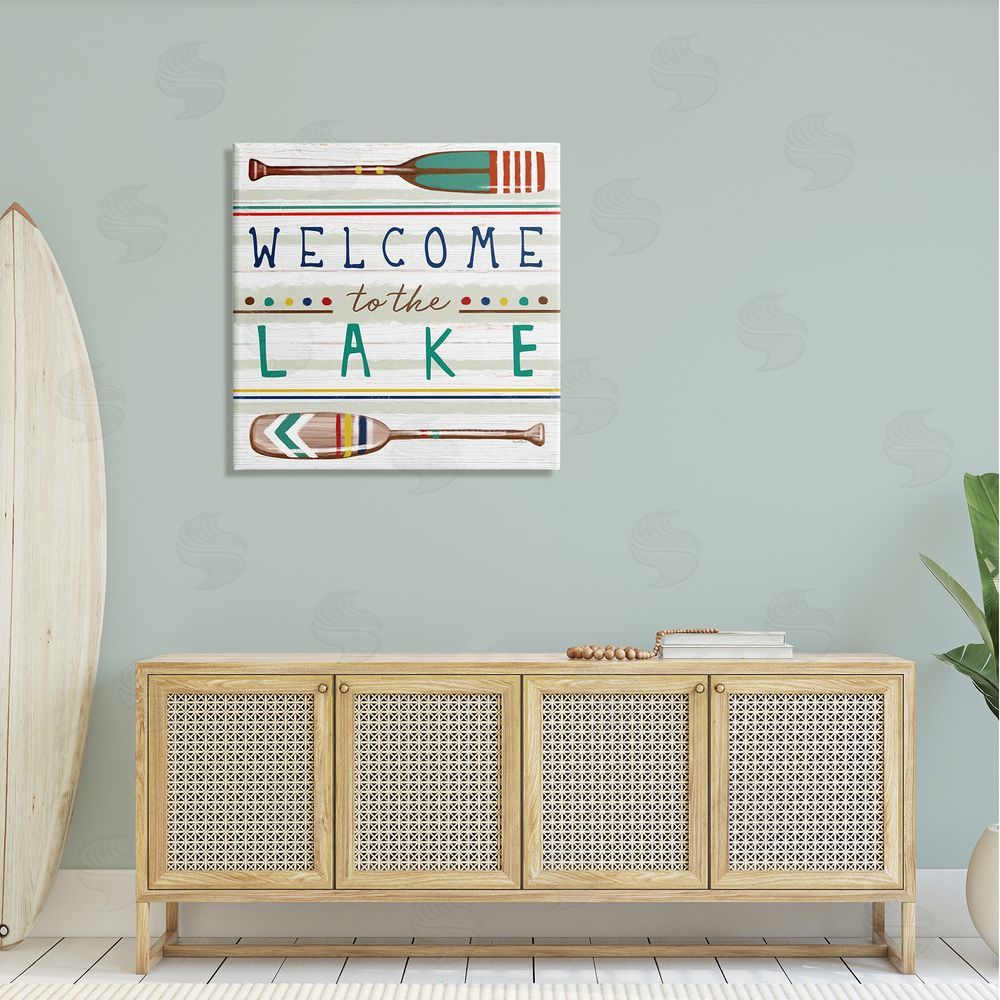Elizabeth Tyndall Welcome to Lake Striped Boat Oars Canvas Wall Art in Room