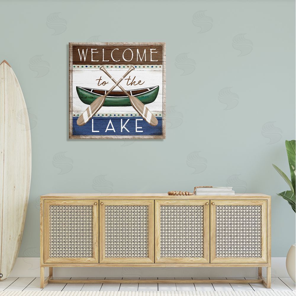 Elizabeth Tyndall Rustic Lake Welcome Canoe Sign Canvas Wall Art in Room