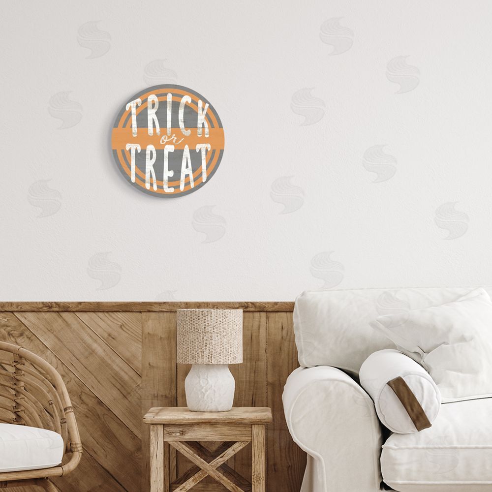 Stupell Studio Vintage Trick Or Treat Sign Round Wall Plaque Art Print in Room