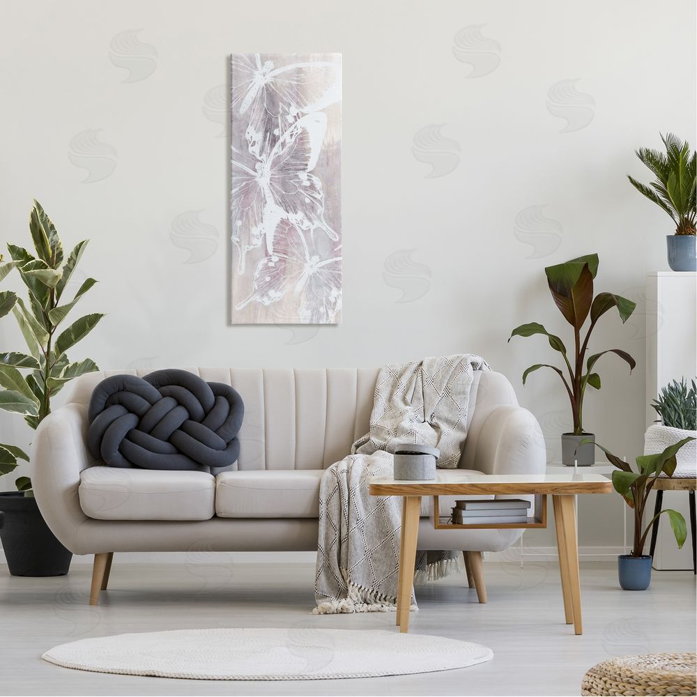 Nina Blue Abstract Overlapping Butterflies Canvas Wall Art in Room