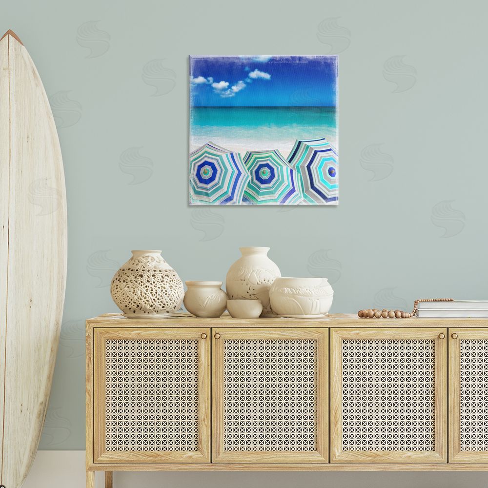 Charlie Carter Three Beach Umbrellas View Canvas Wall Art Print in Room